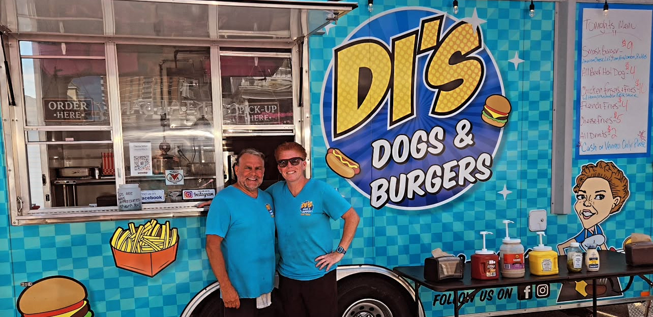 HOME PAGE Ray & Dianna pose in front of Di